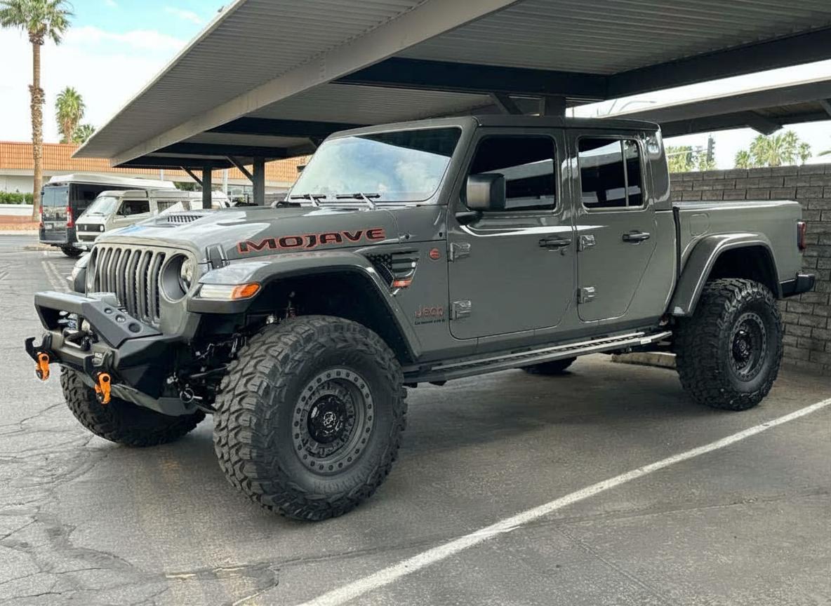 2023 Jeep Gladiator on 17x9.5 Black-Rhino Abrams - Gray wheels with 345/75 tires, AEV leveling kit