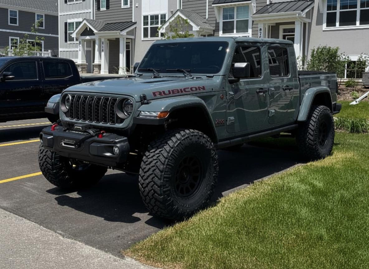 2024 Jeep Gladiator on 17x8.5 Method MR703 - Matte Black wheels with 345/80 tires, Clayton lift 3.5"