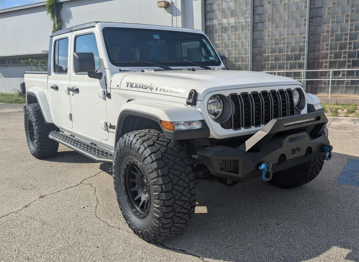 2023 Jeep Gladiator on 17x9 Fuel Fortress - Matte Black wheels with 320/70 tires, Rough Country lift 2.5"